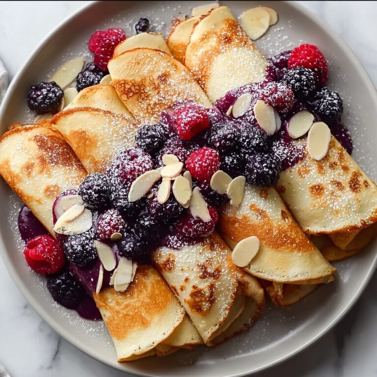 Almond Crepes with Warm Berries Recipe