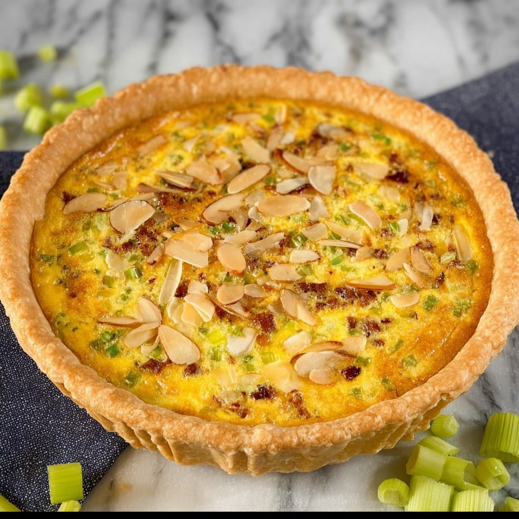 Neiman Marcus Bacon and Almond Cheddar Quiche Recipe - Recipe Image