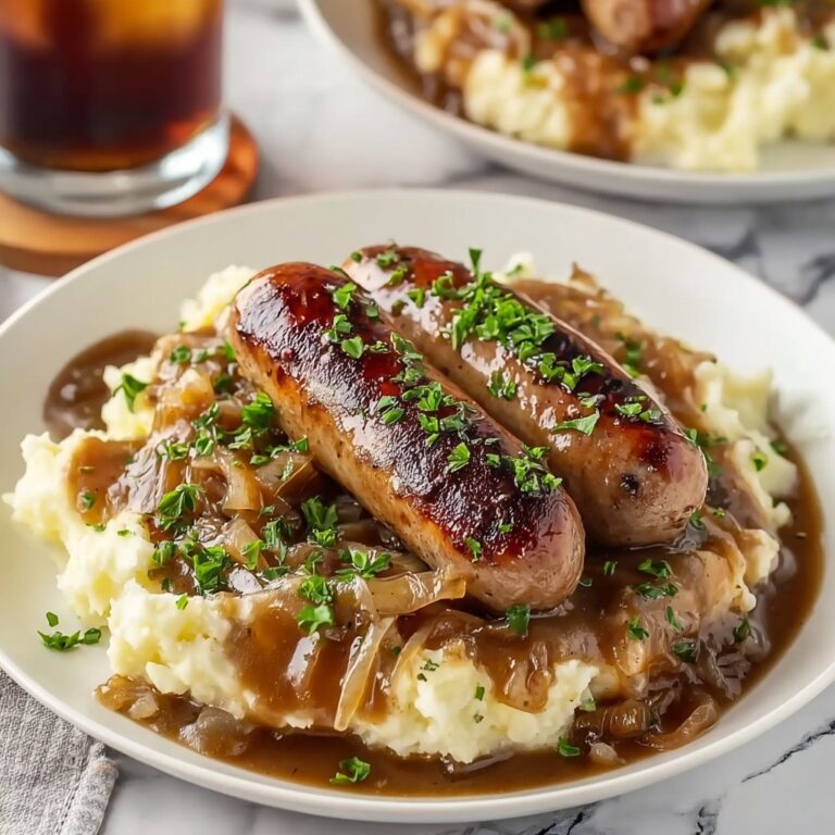 Bangers and Colcannon with Guinness Onion Gravy Recipe
