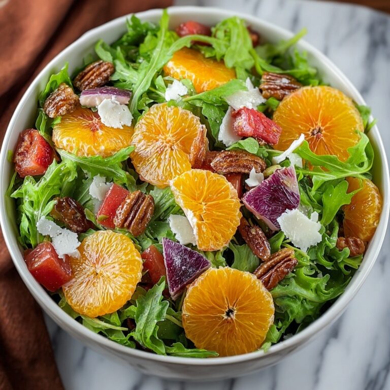Citrus Arugula Salad with Goat Cheese and Toasted Nuts Recipe